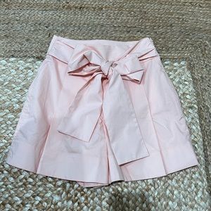 Light pink high waisted bow shorts
